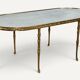 Maison Baguès coffee table in gilded bronze and aged mirror – 1950s