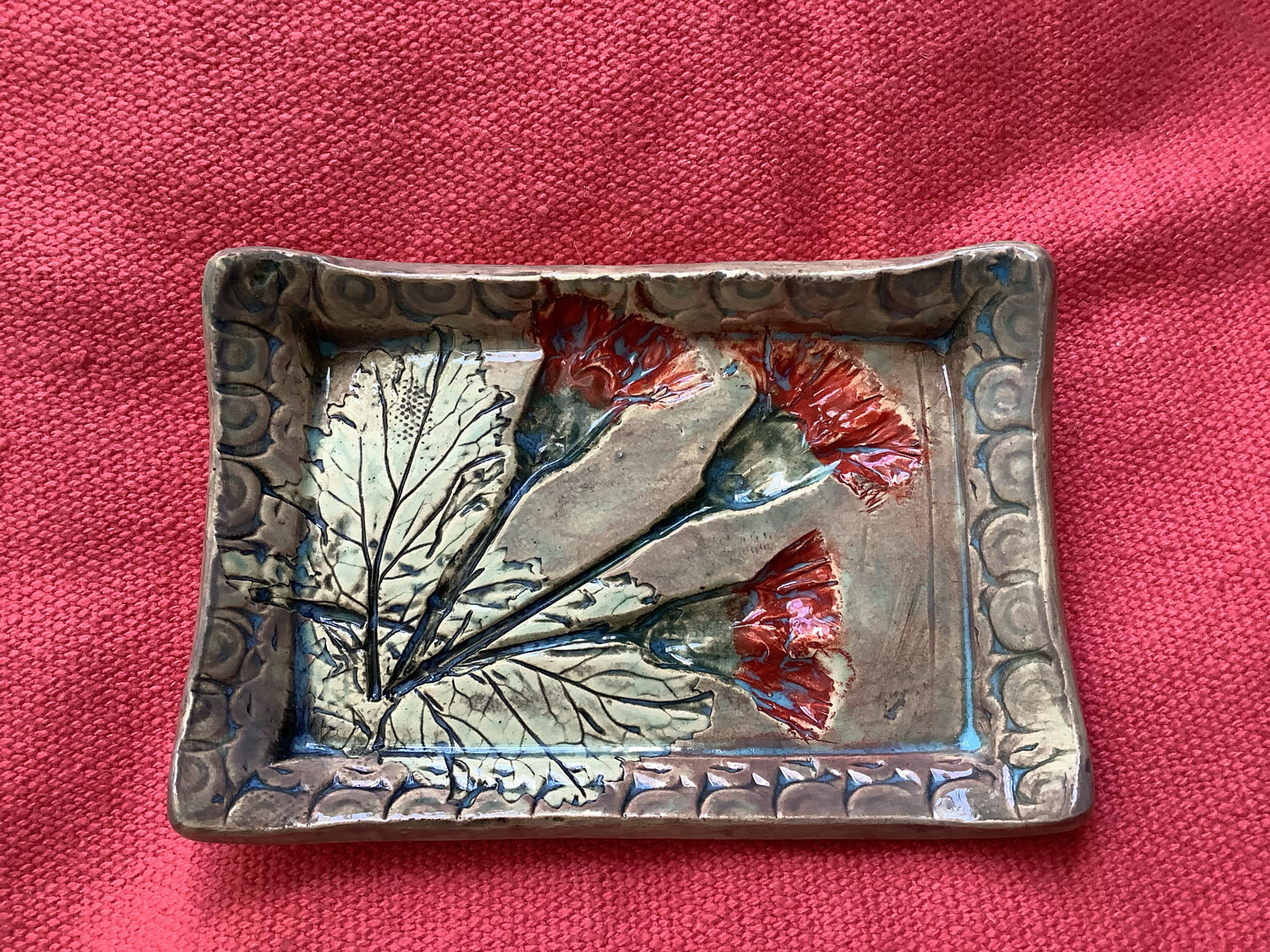 Arty enameled terracotta dish signed by the artist