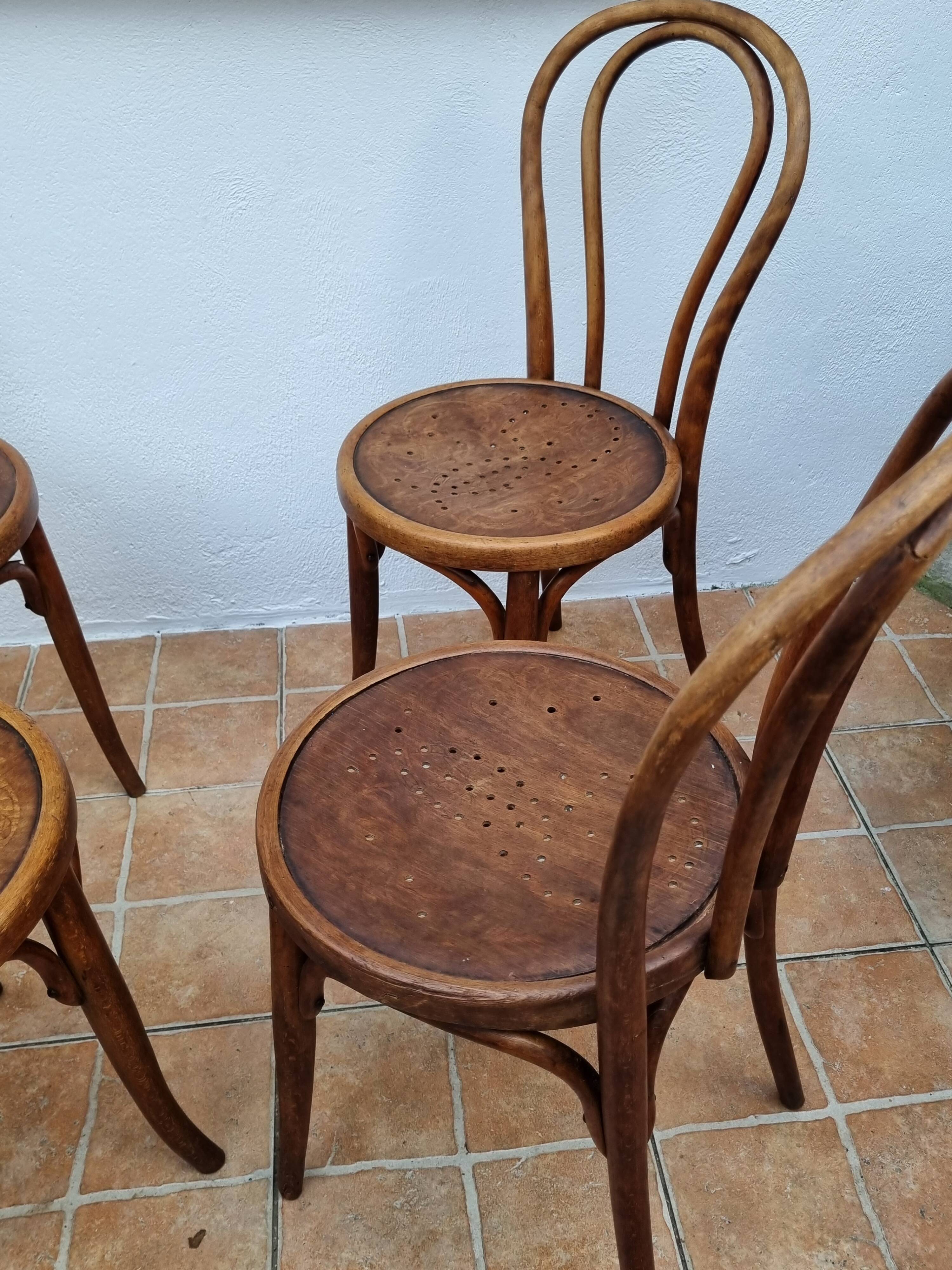 Set of 4 bentwood bistro chairs, stamped "Jacob & Josef Kohn", late 19th century