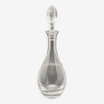 Transparent glass wine carafe with worked stopper