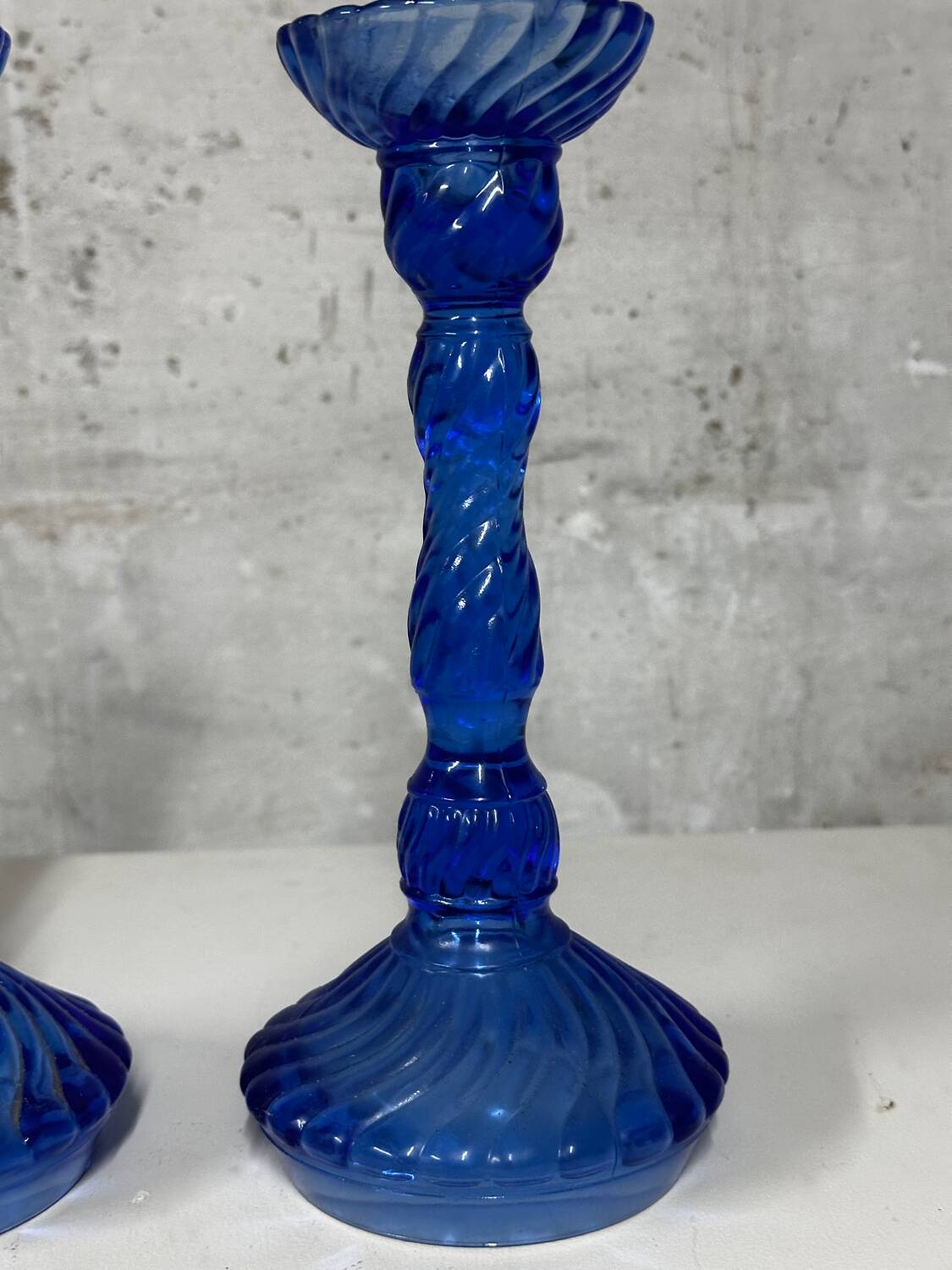 Pair of vintage cobalt blue twisted glass candlesticks h 24.5 cm