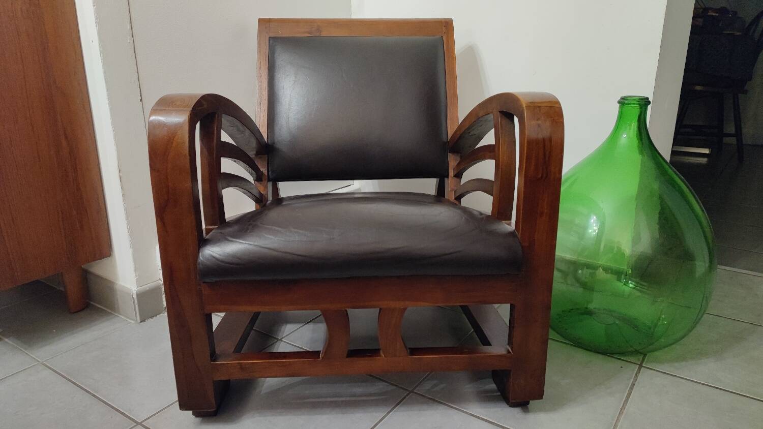 Leather and teak armchair