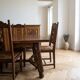 Dining table set with 6 chairs in cherry wood.