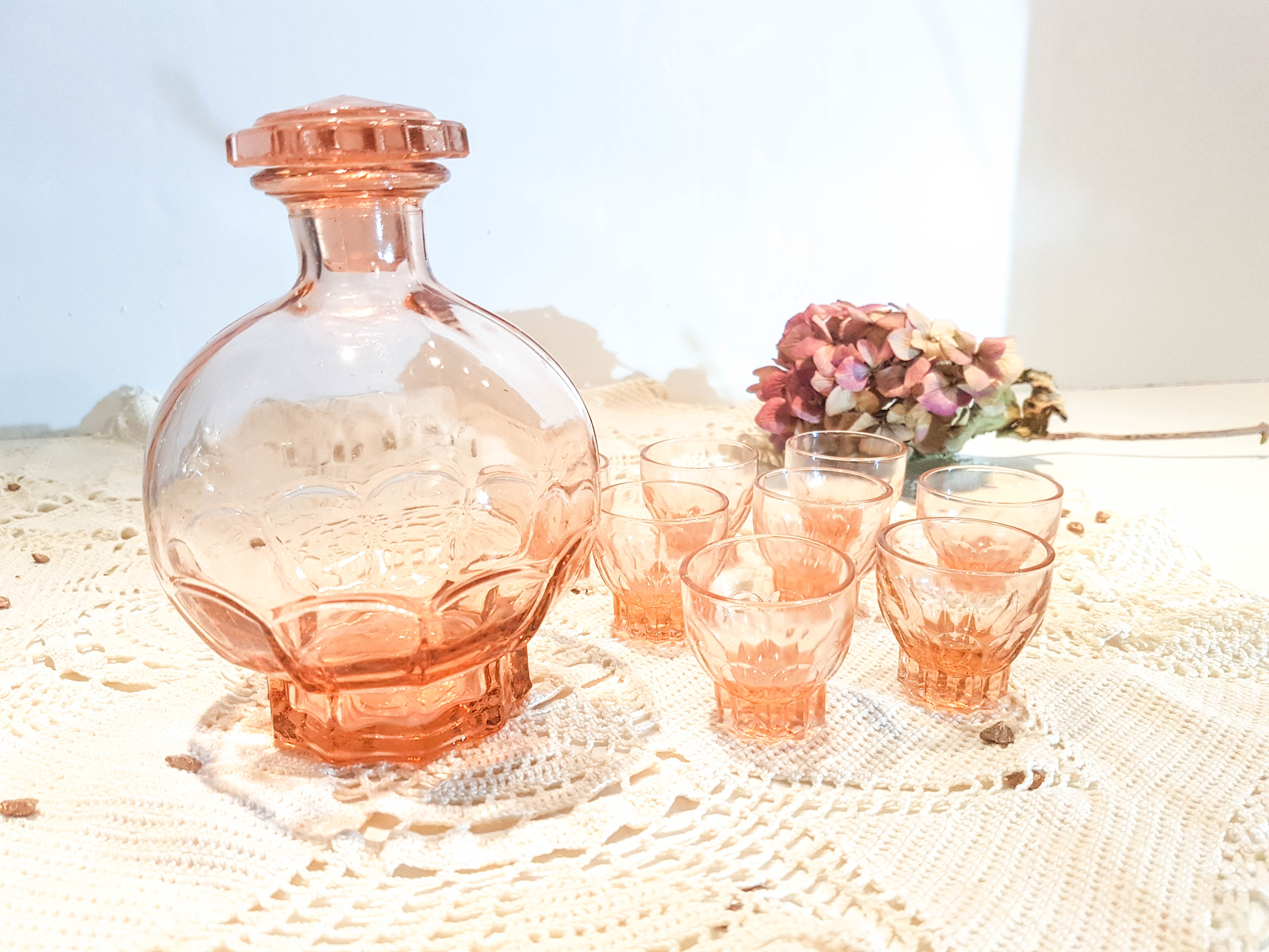 Art Deco-style pink liquor service