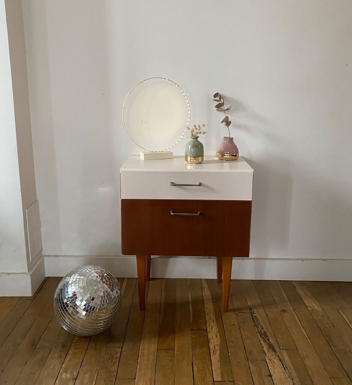 Wooden bedside table and nude