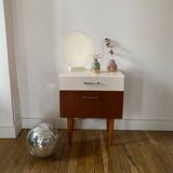 Wooden bedside table and nude