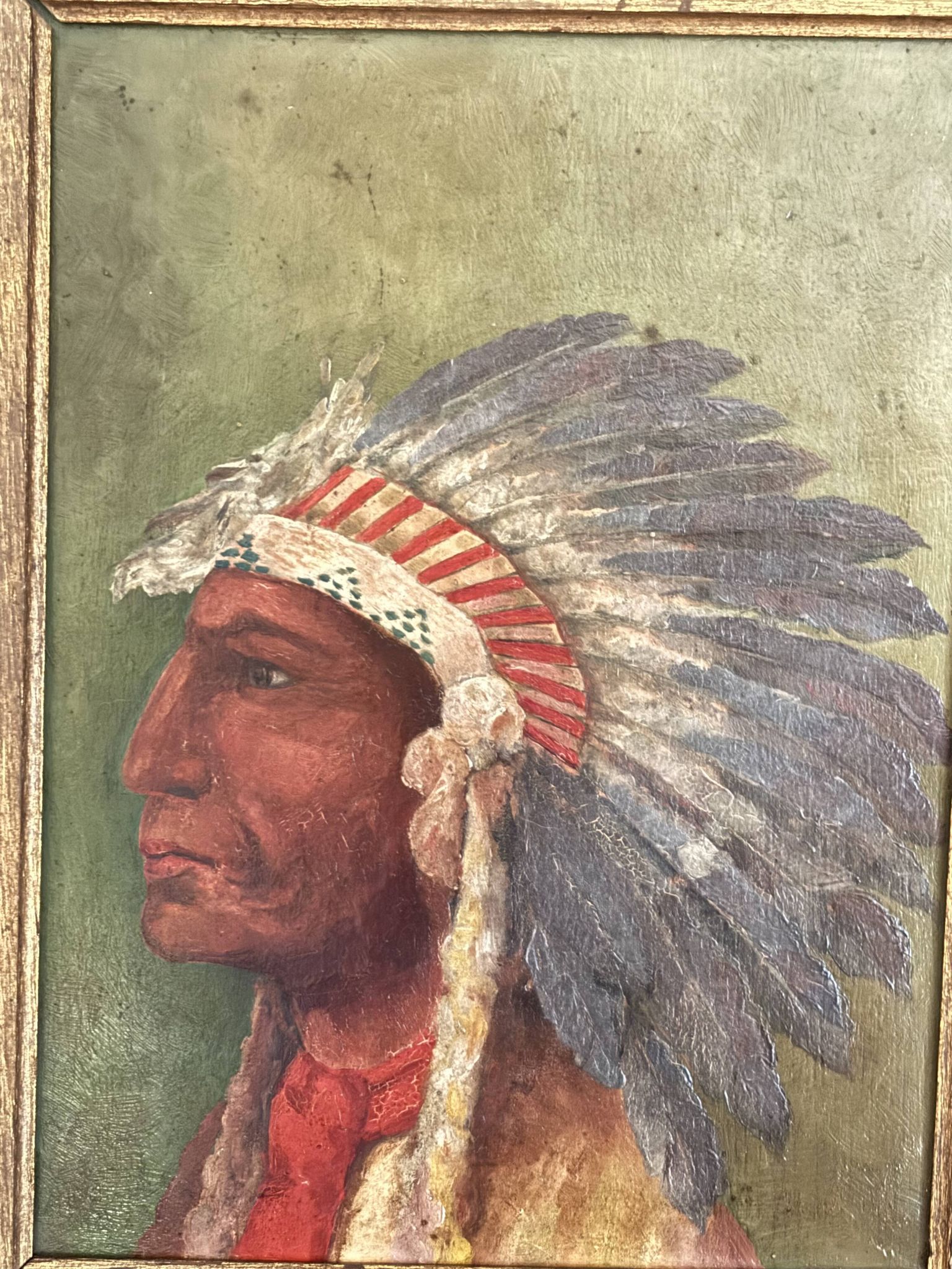 Old oil painting on panel of a Native American chief from the 19th century Wild West.