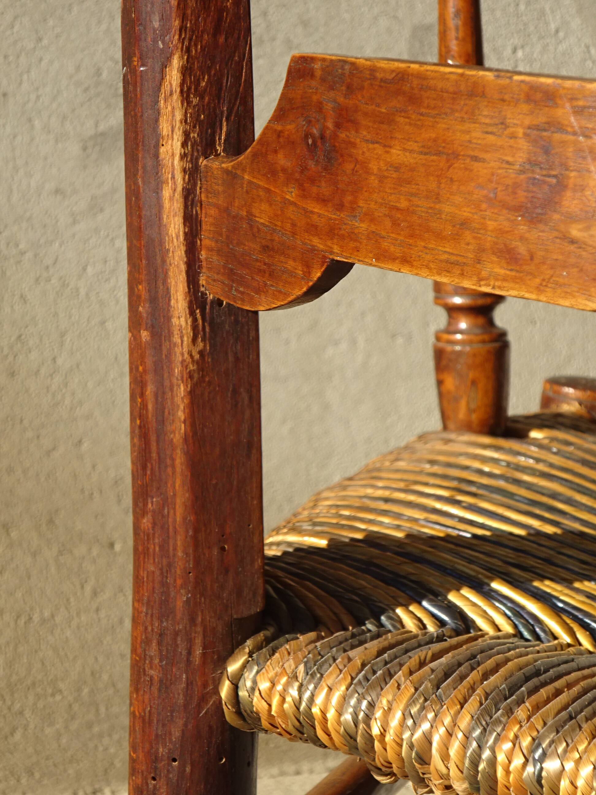 old armchair with leather armrests, from the 19th century