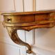 Console murale en bois et stuc dorée mi XIXeme