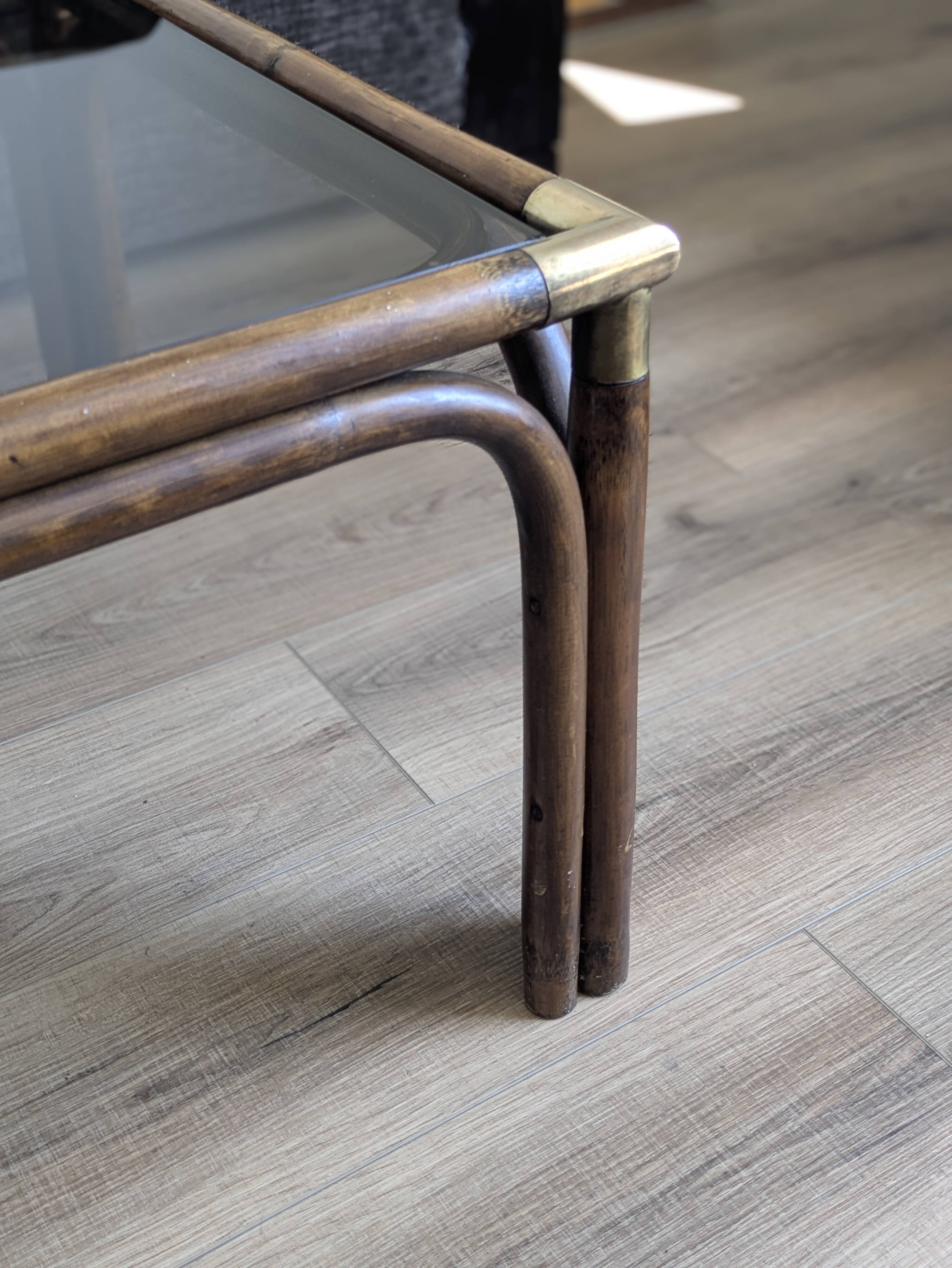 Bamboo coffee table with brass corners and smoked glass