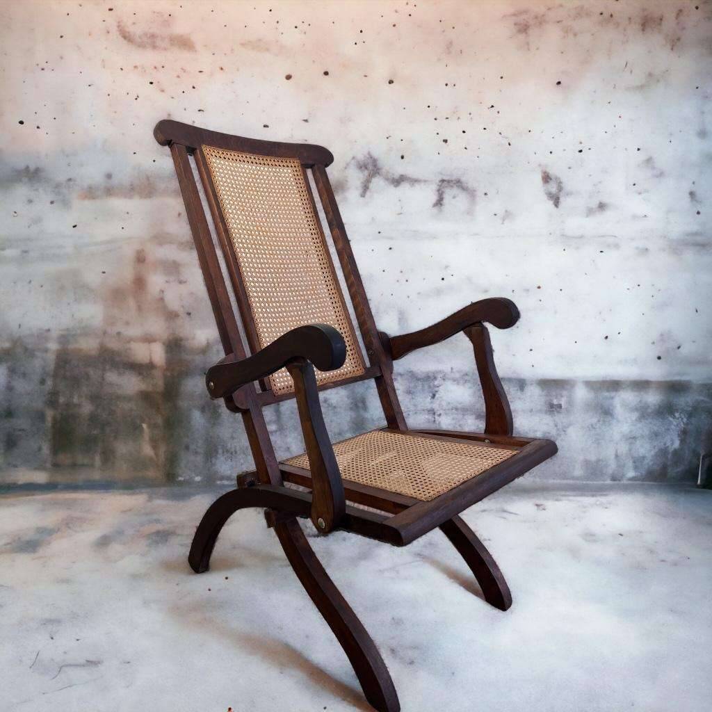 Antique folding chair with weaved seat/back
