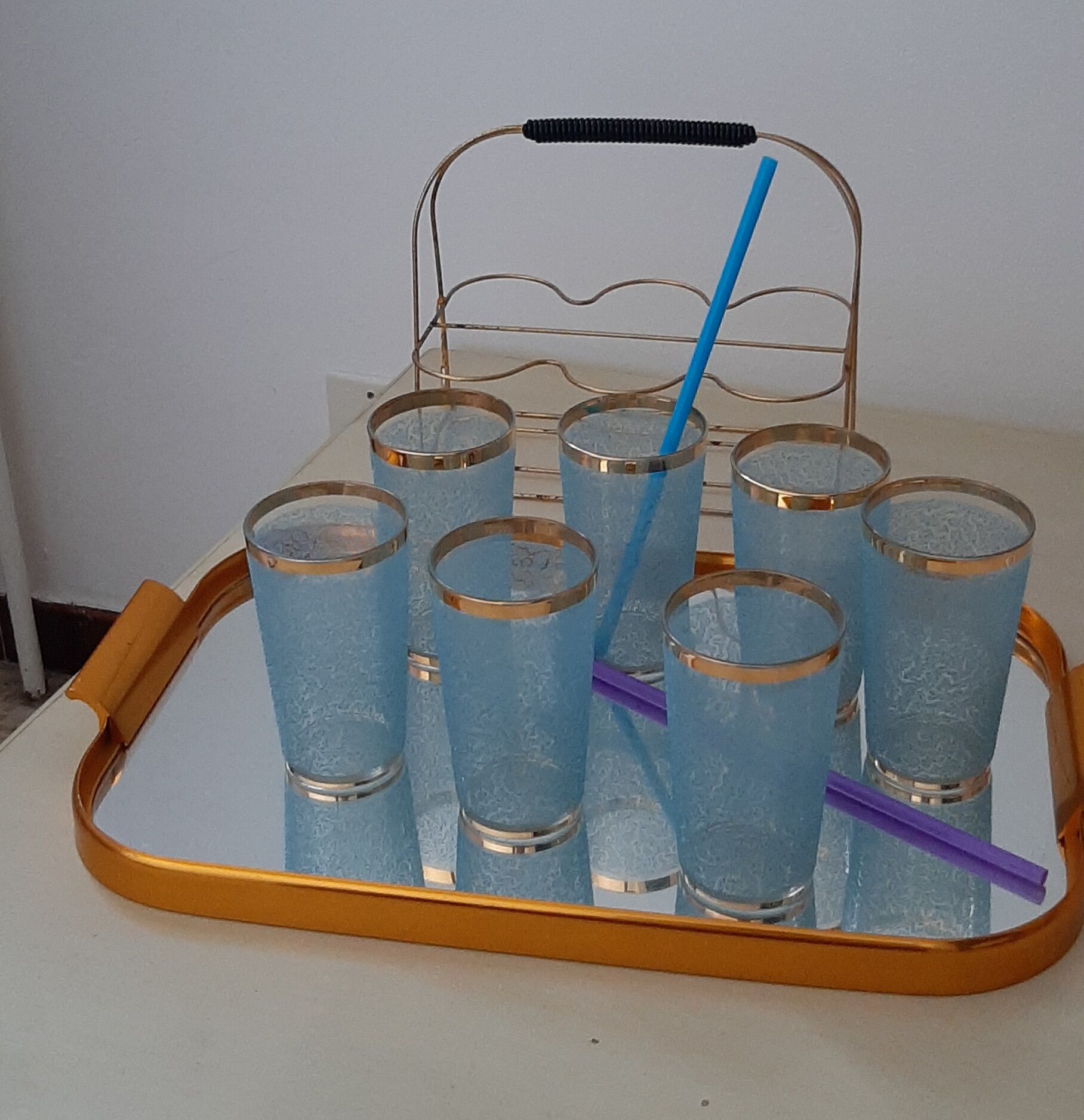 Support and glass for orangeade