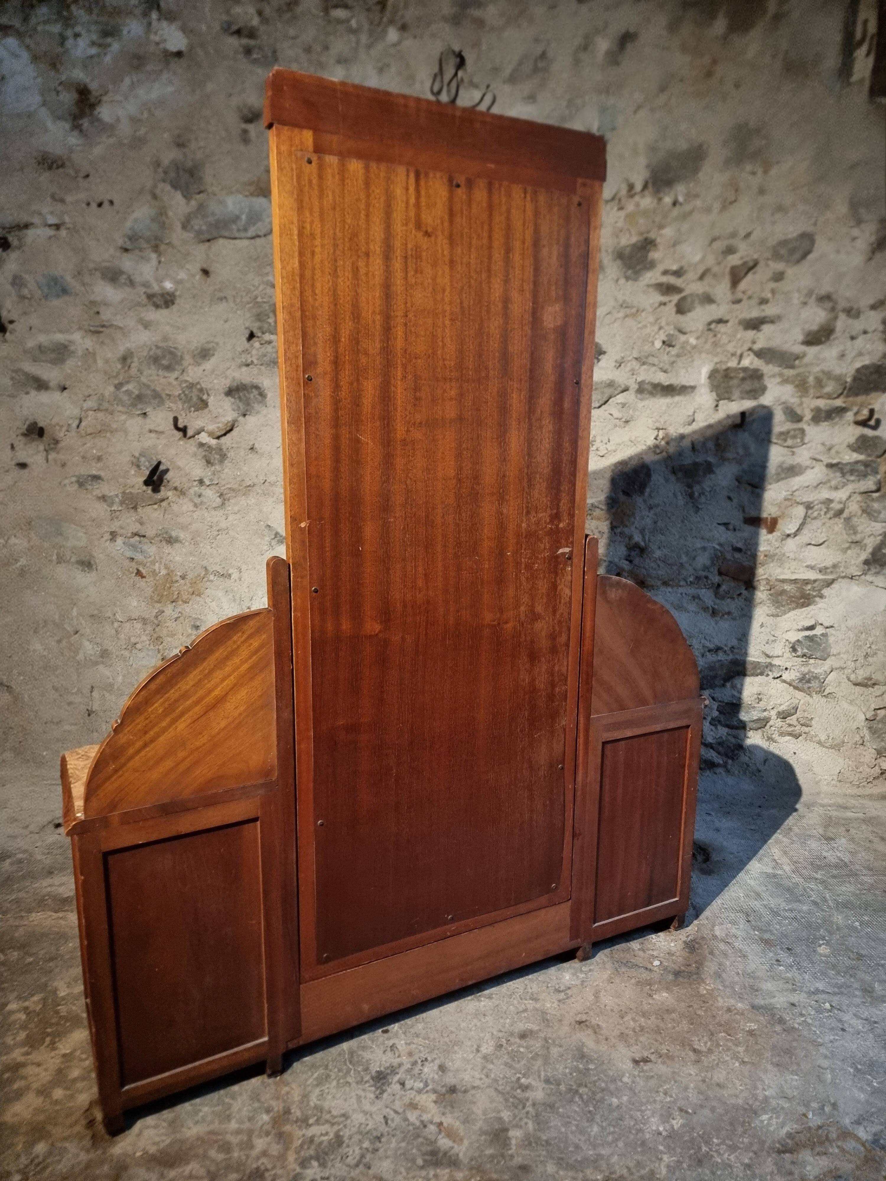 Art Deco mahogany dressing table with bevelled tilting mirror, France, 1920s–1930s.