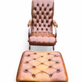 Pair of leather Chesterfields and footstools