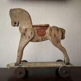 Jouet ancien/vintage cheval en bois à roulettes années 50