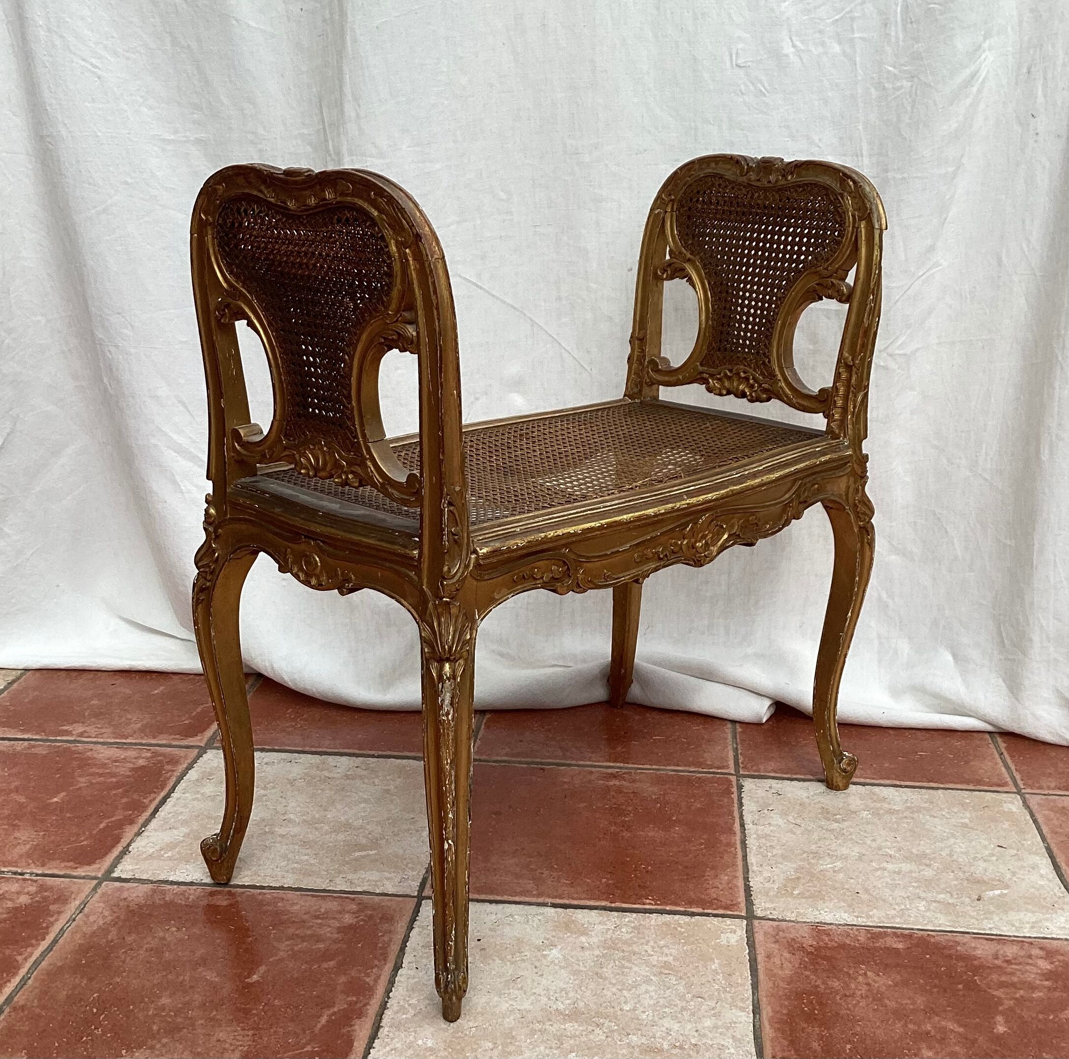 Bench in gilded wood seated in canning dimension: height -71cm- width -66cm-