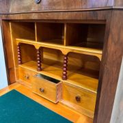 curved secretary in the guise of a Napoleon III period weekly desk