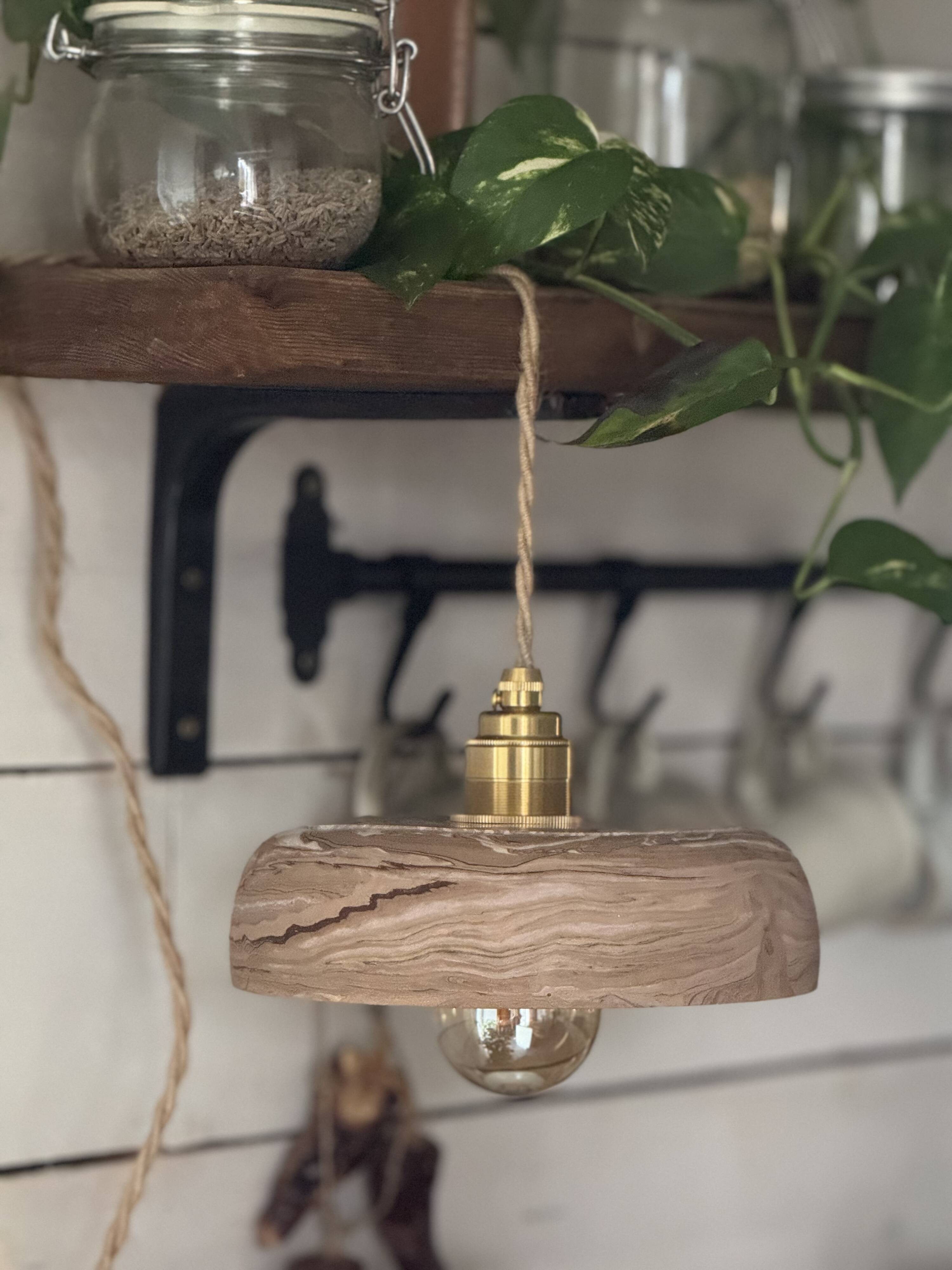 Handcrafted portable lamp with a marbled stone effect
