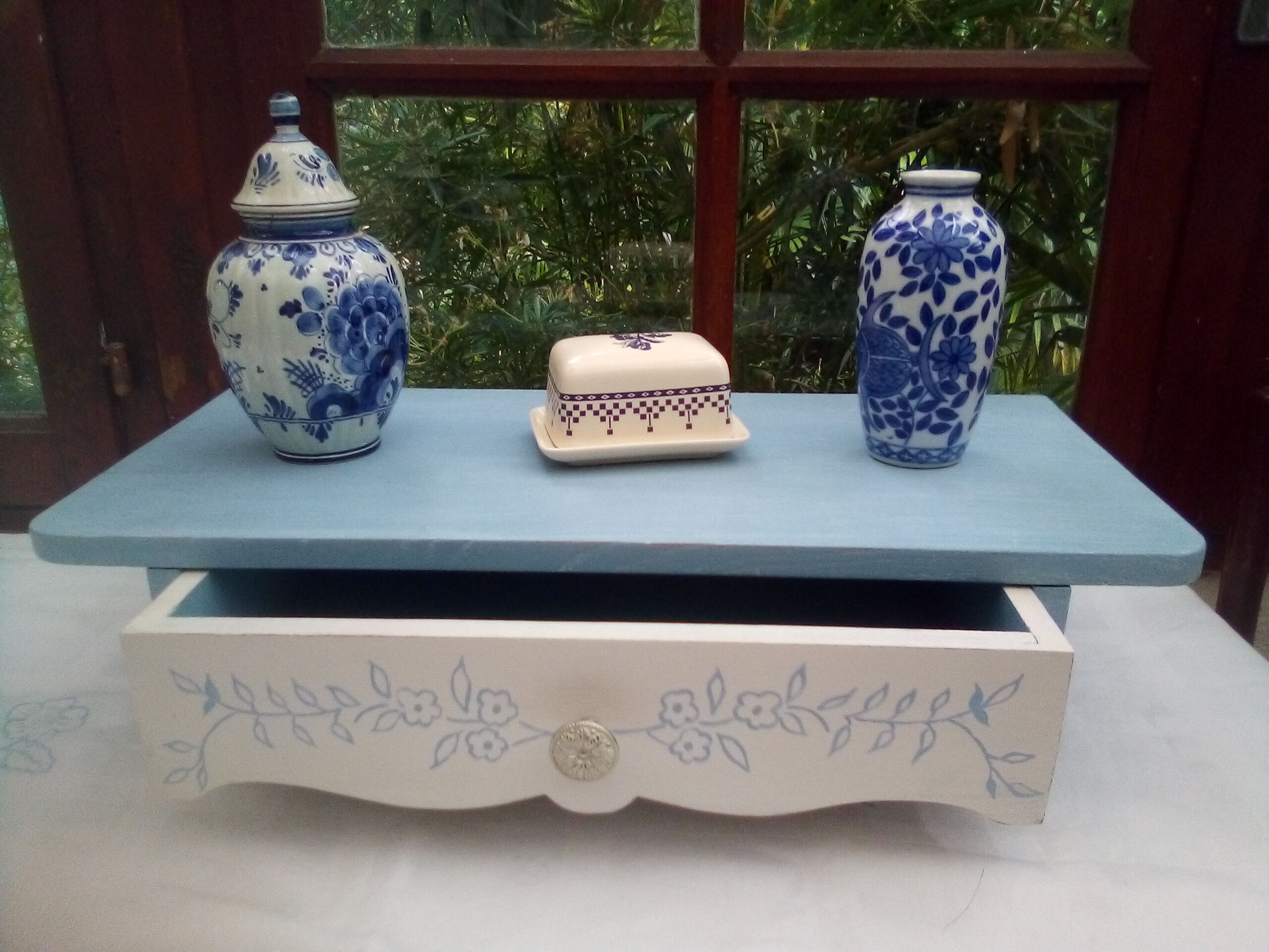 Old wooden shelf with drawer