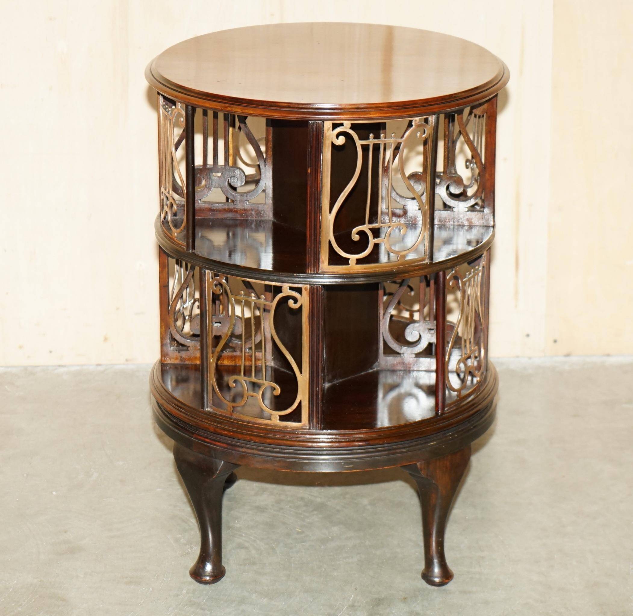 Restored Victorian library table in hardwood and brass.