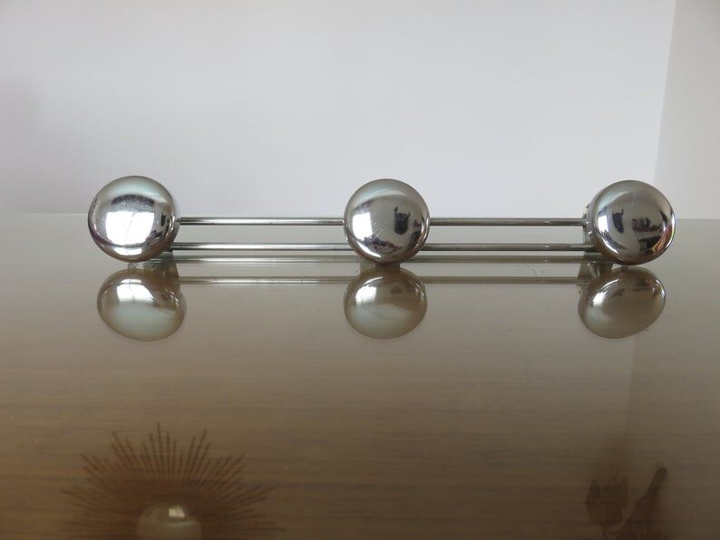 3-70s gold metal coat holder