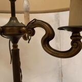 Floor lamp has three brass light arms