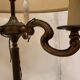 Lampadaire a trois bras de lumière en laiton