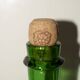 Bouteille vintage en verre vert