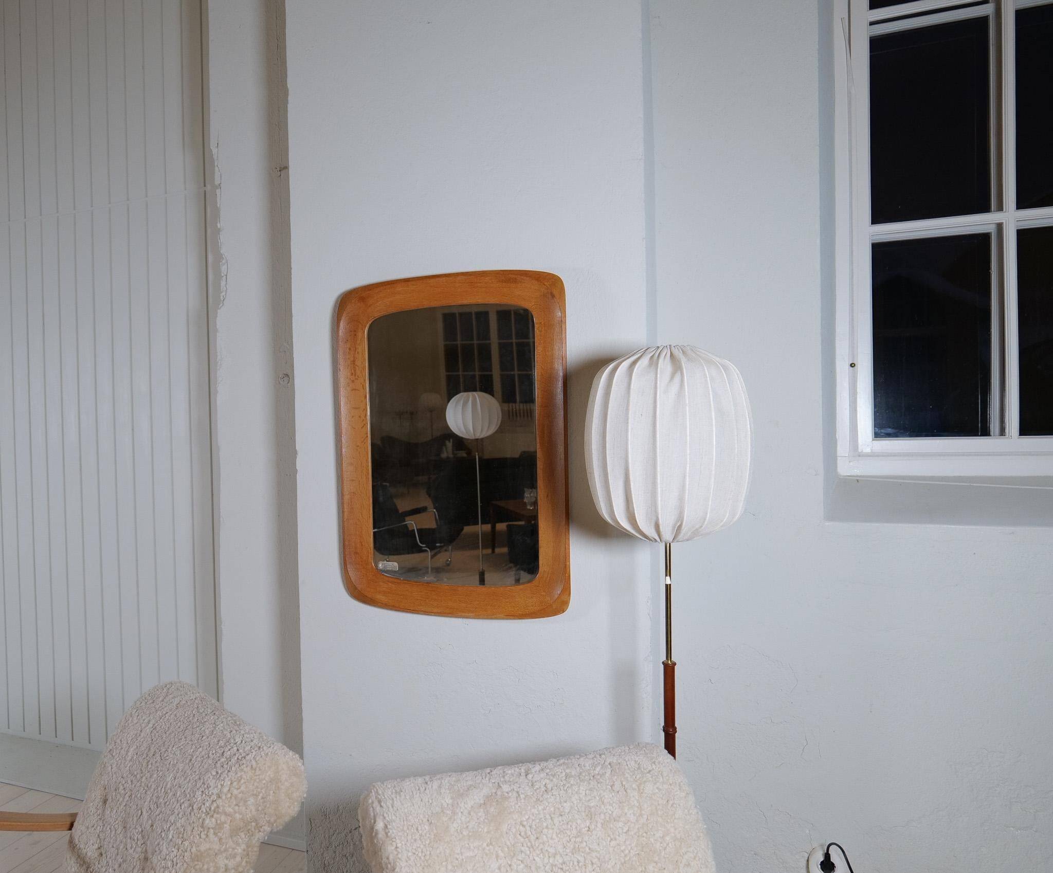 Mid-century modern sculptural wall mirror, oak, crystal glass, Glas & Trä, 1960s