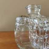 Glass carafe in the shape of a perfume bottle