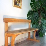 Solid wood school bench from the early 20th century.