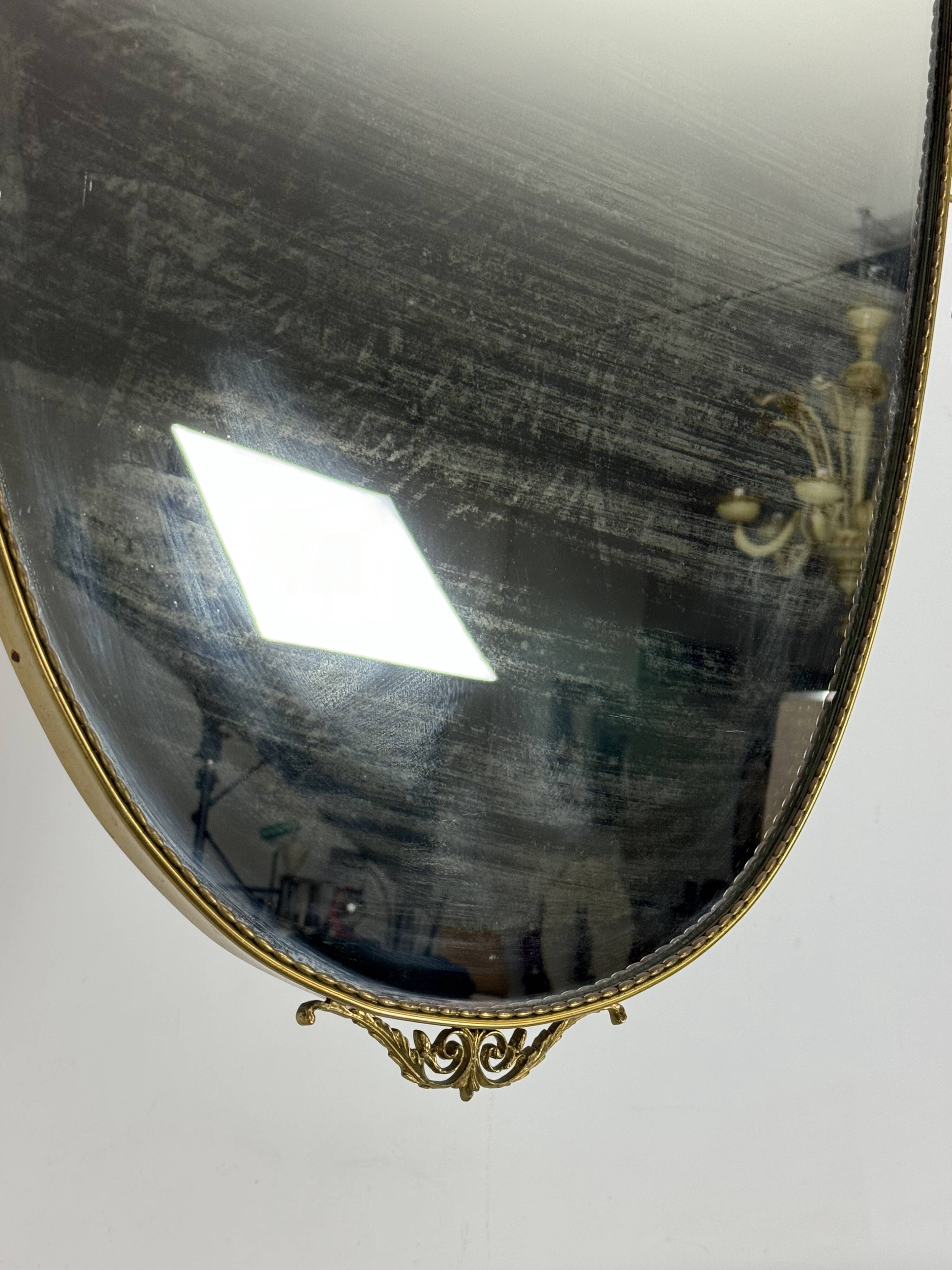 Mid-century Italian mirror in brass. Italy 1950s