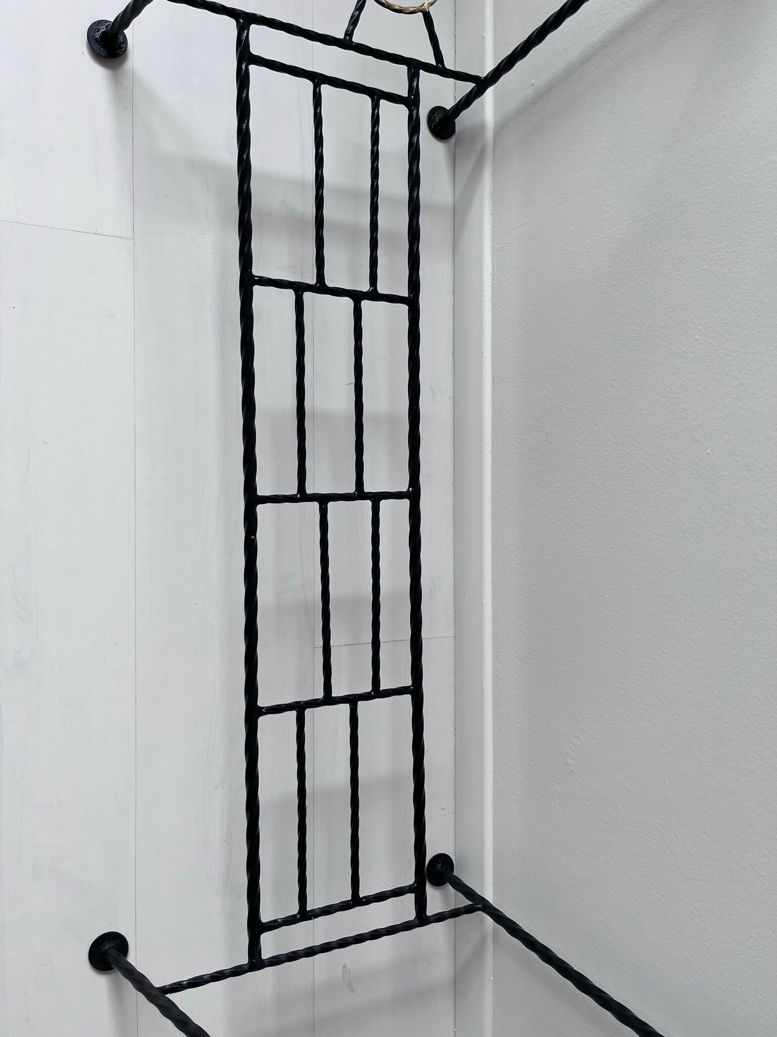 Wrought iron coat rack
