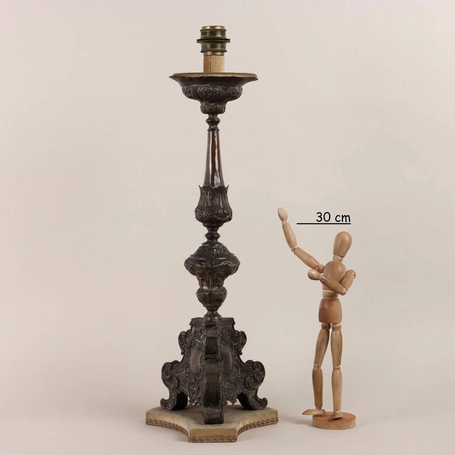 Antique candelabrum converted into a lamp, 18th-19th century.