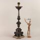 Antique candelabrum converted into a lamp, 18th-19th century.
