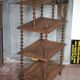 Napoleon III spool shelf, floor-standing shelf with brass tips.