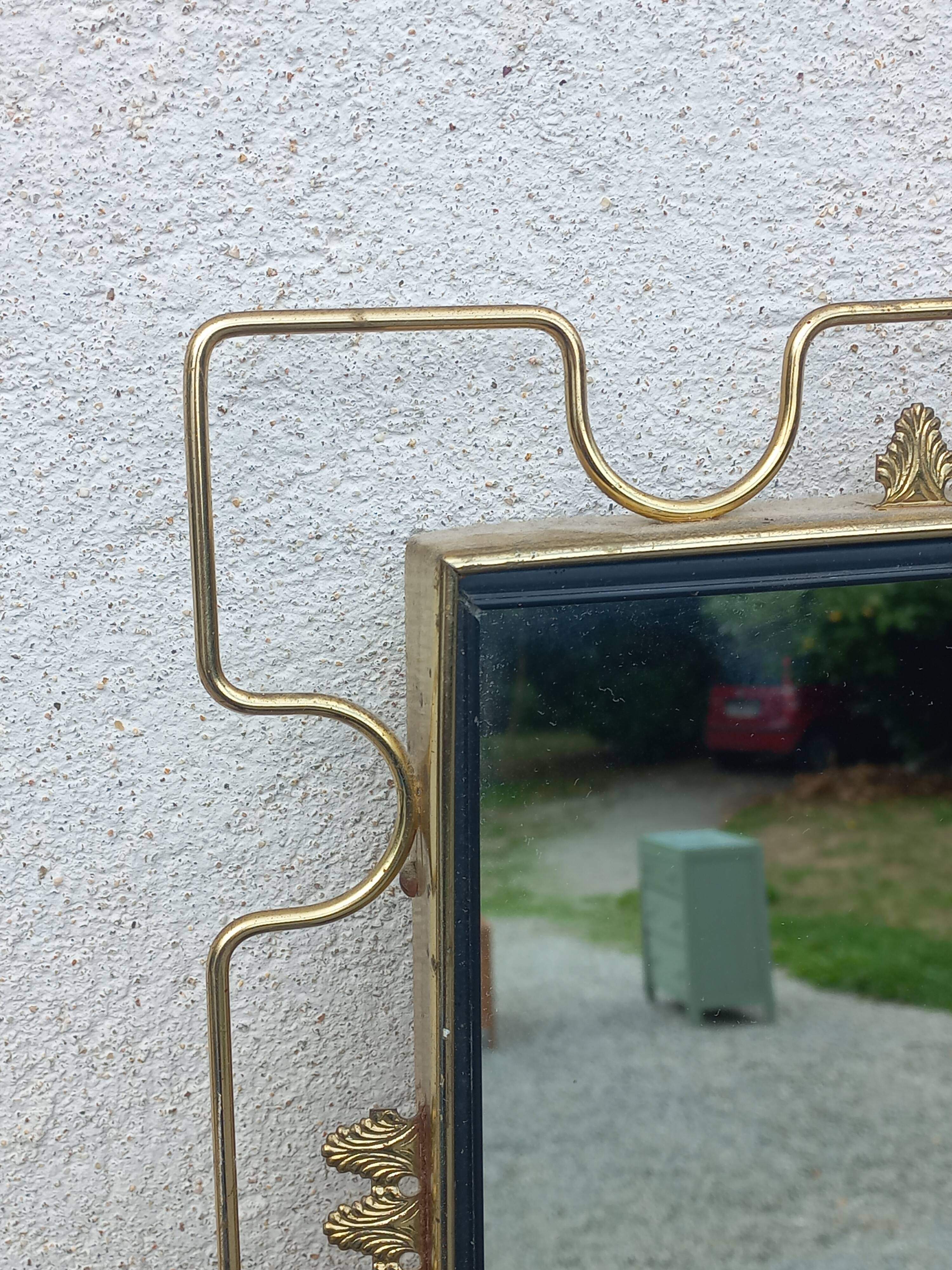 Vintage 1950s neoclassical style gold metal mirror