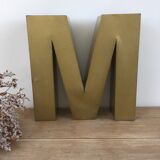 Golden vintage sign letter M