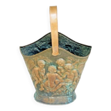Antique red copper umbrella stand decorated with putti angels.