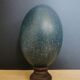 Emu egg naturally green / blue on dark wood bases