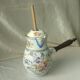 Limoges porcelain chocolatiere with its moussoir