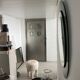 Decorative round wall mirror in smoked glass, Space Age Italian collectible