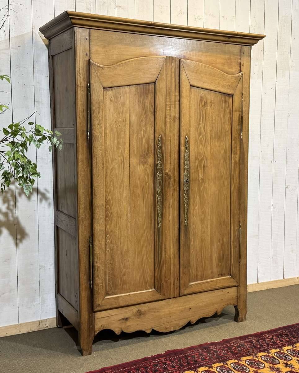 19th-century country wardrobe in blonde chestnut.