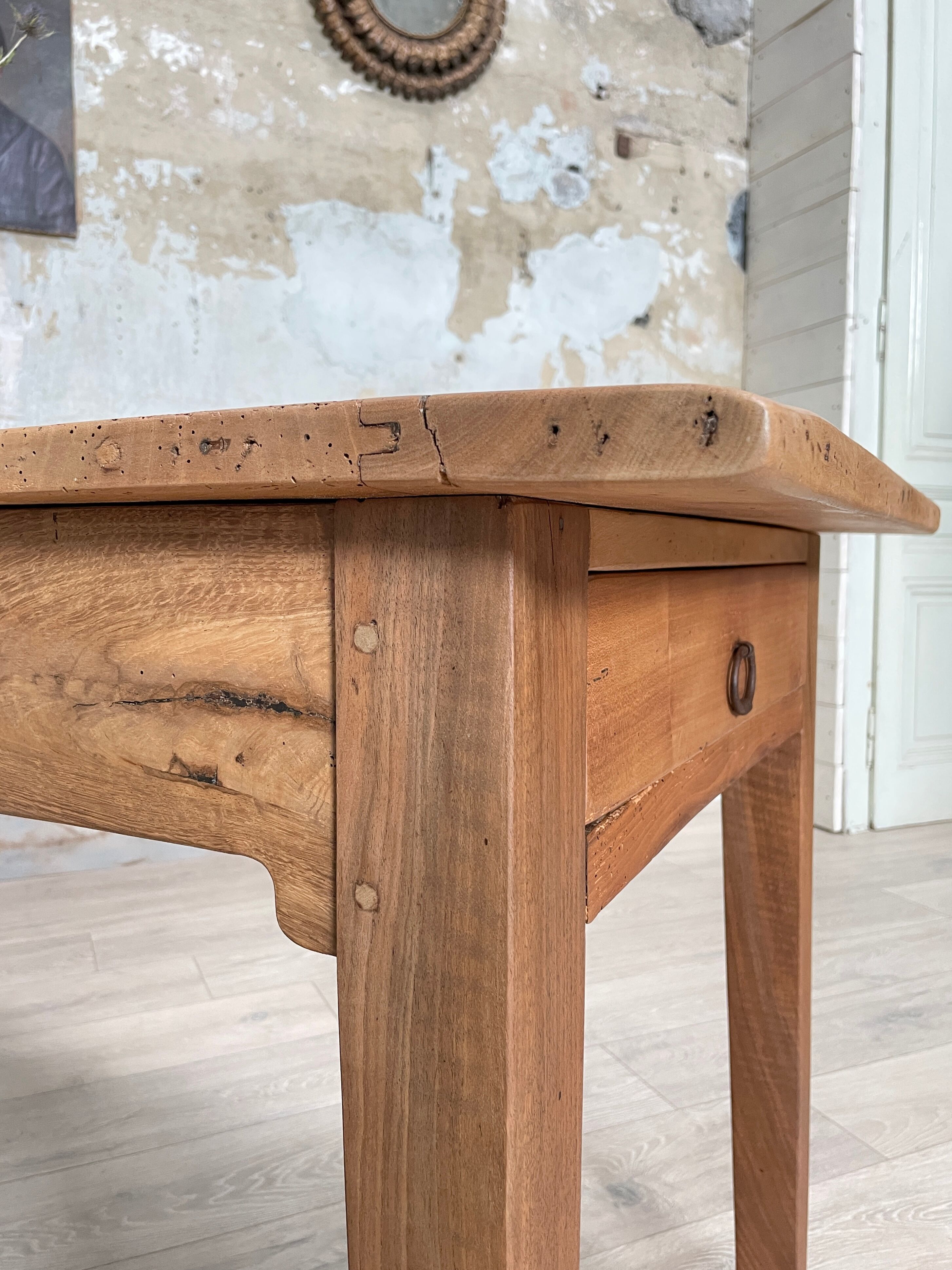 Vintage farmhouse table with spindle legs.