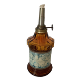 Oil lamp in amber glass, early twentieth century