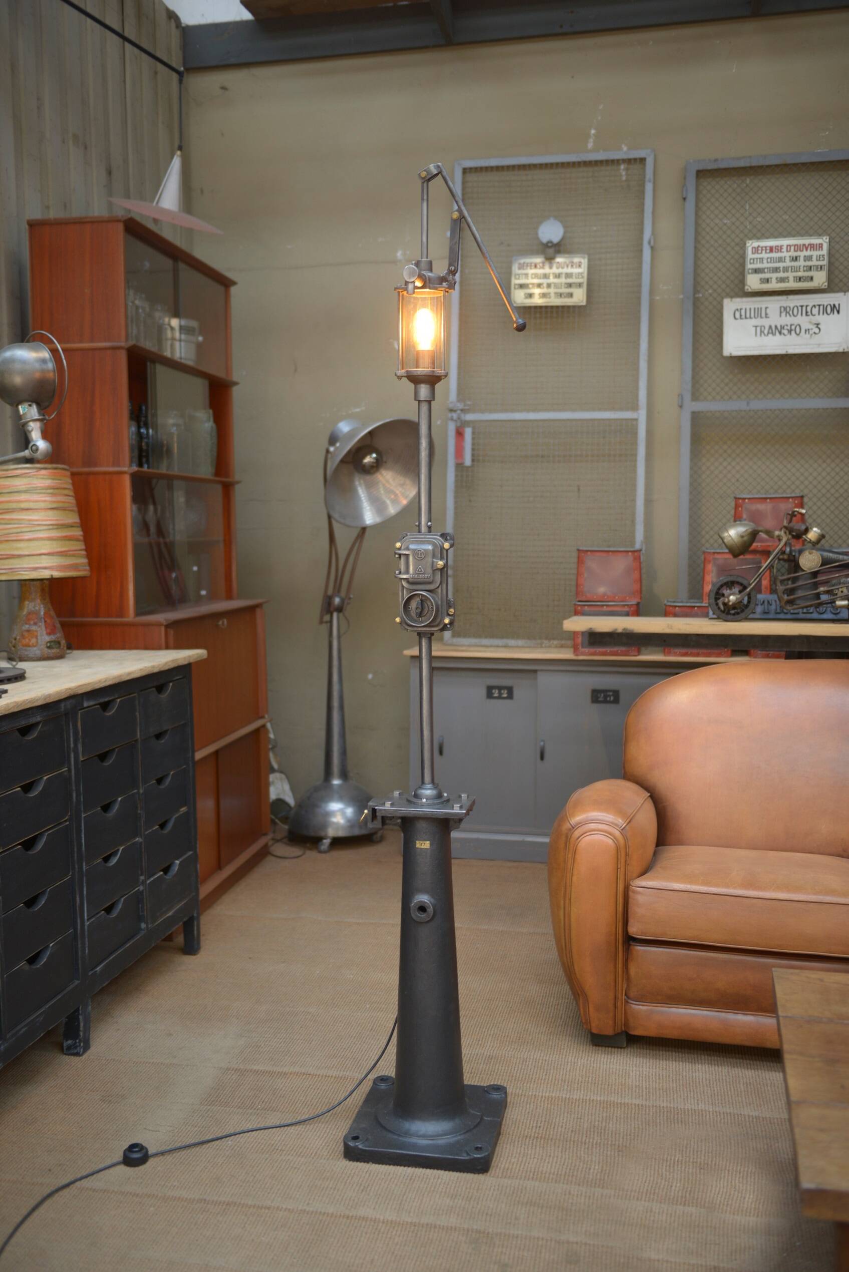 Old gas pump floor lamp in cast iron metal and glass 1930
