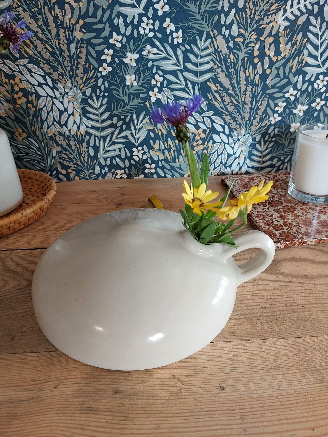 Vintage white enamelled stoneware bottle