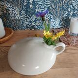 Vintage white enamelled stoneware bottle