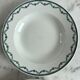 Set of two green frilled deep plates from Saint-Amand.