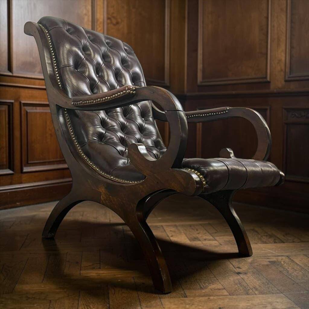 Vintage Chesterfield armchair in dark brown leather / single seat